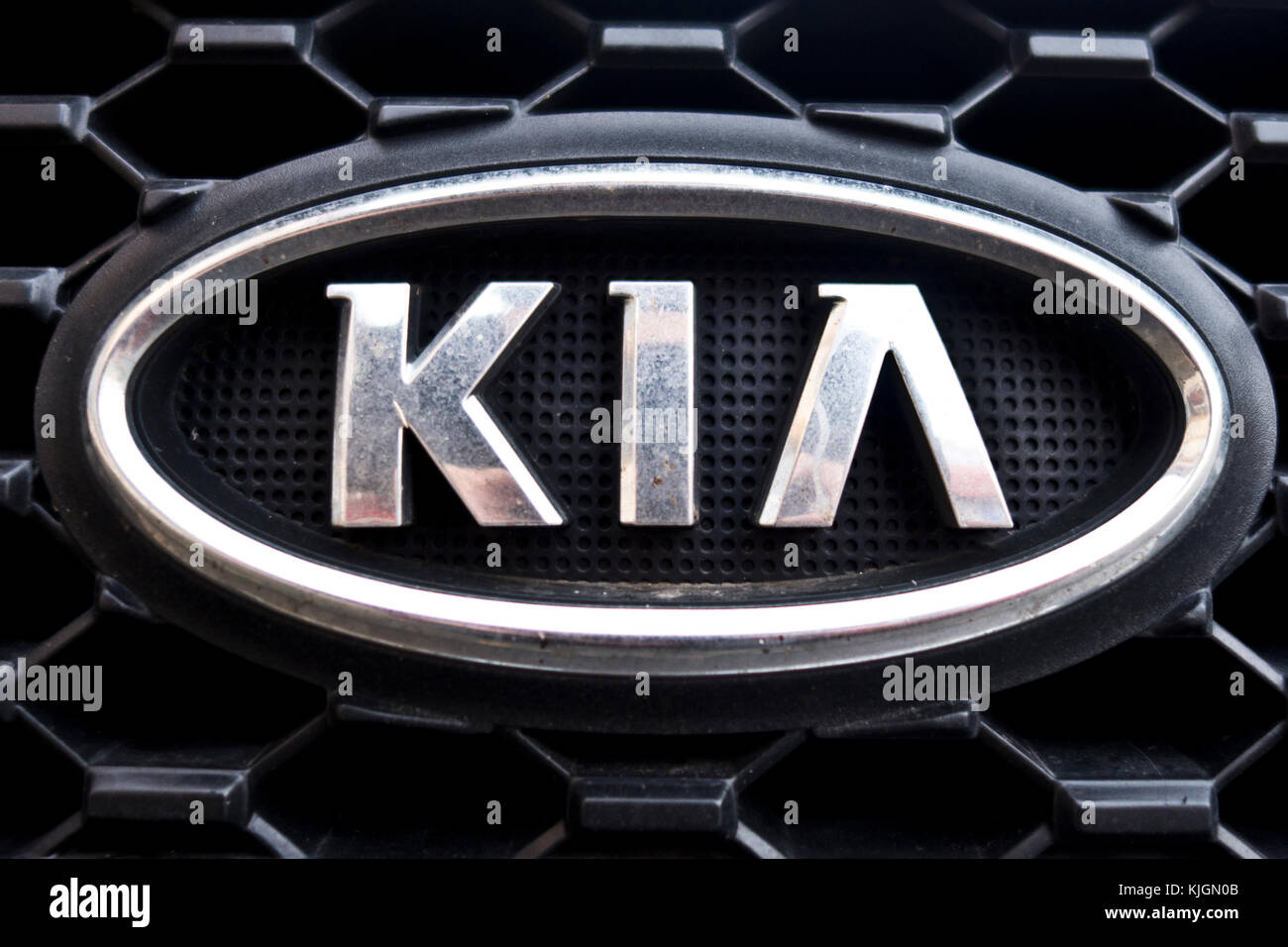 Kia logo on car grille Stock Photo