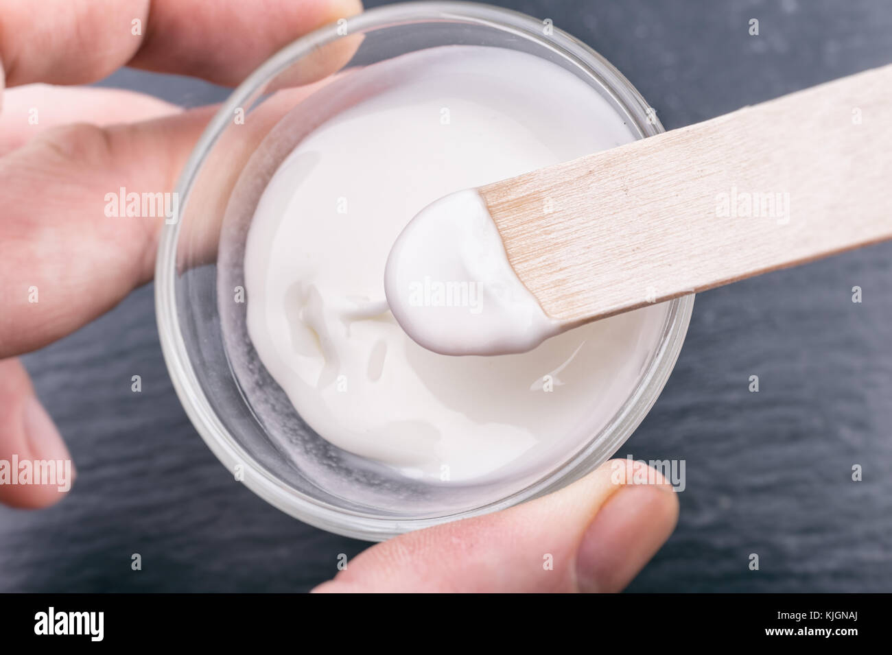 Baking soda paste on a wooden stick Stock Photo Alamy