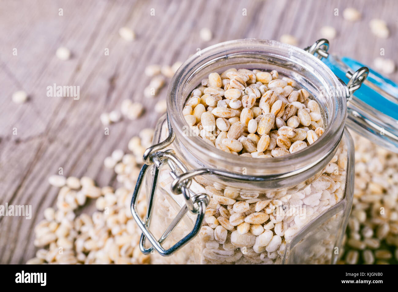 Pearl barley grains in a glass jar Stock Photo