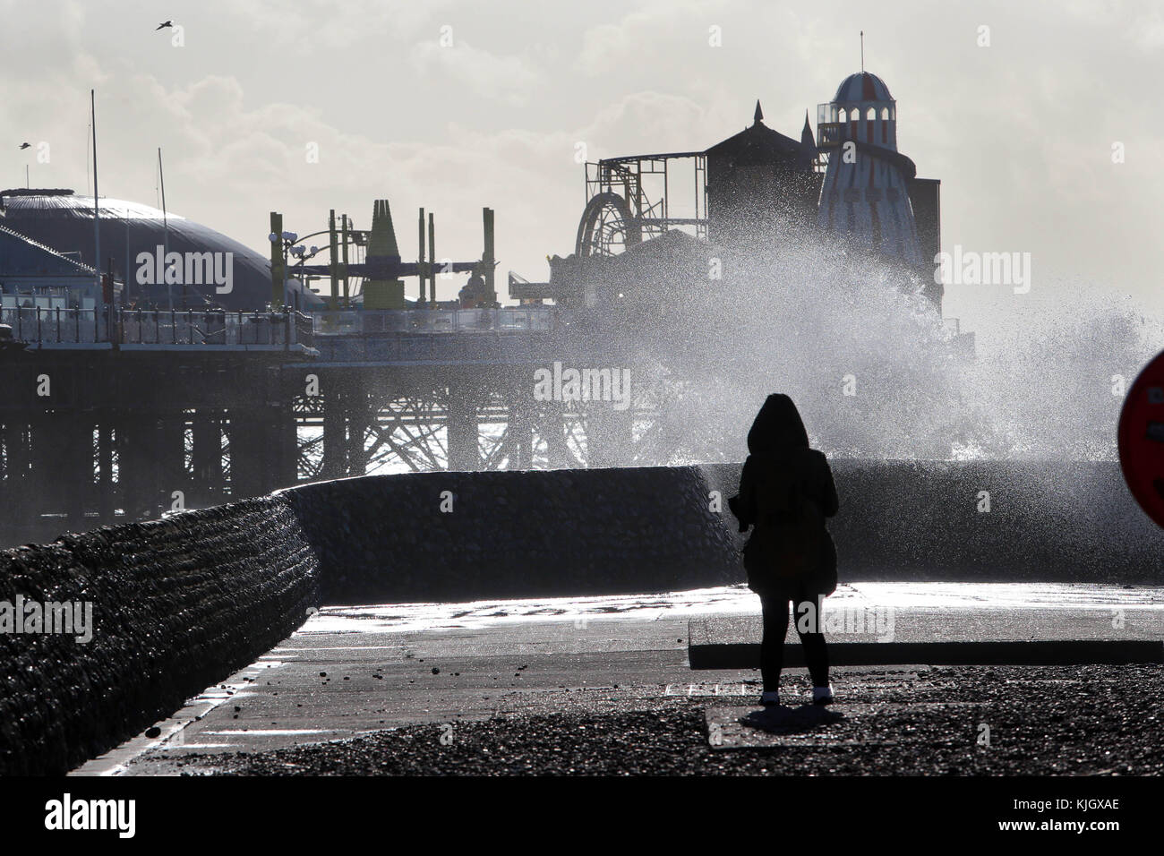Brighton, UK. 23rd November, 2017. High winds and seas whip up a sea spray in Brighton as Britain braces for a bout of stormy weather as the Met Office issue warnings.. Credit: Nigel Bowles/Alamy Live News Stock Photo