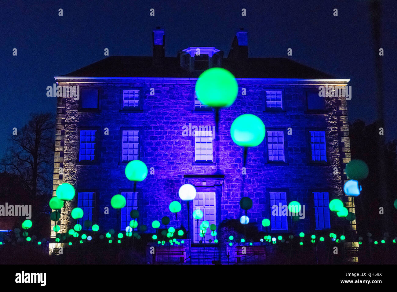 Edinburgh, Scotland, United Kingdom. 24 November, 2017. Edinburgh's newest festive event, Christmas at the Botanics, opened this evening . The illuminations held inside Edinburgh's Royal Botanic Gardens runs for 29 nights. Inverleith House with spheres of light in the Bloom display. Credit: Iain Masterton/Alamy Live News Stock Photo