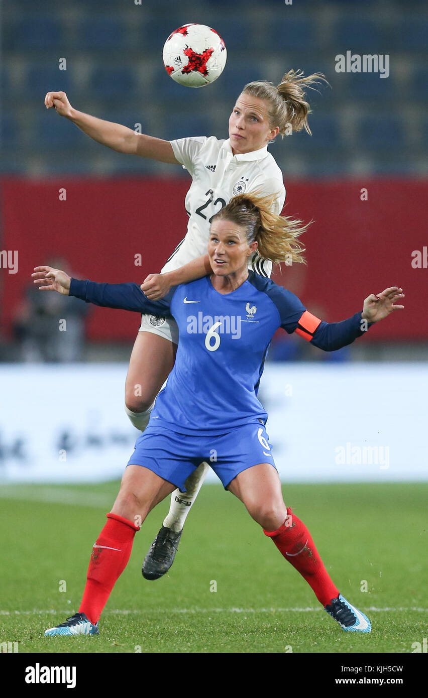 Germany's Tabea Kemme (above) in action against France's Amandine Henry (below) during the women's international friendly soccer match between Germany and France in the Schueco Arena stadium in Bielefeld, Germany, 24 November 2017. Photo: Friso Gentsch/dpa Stock Photo