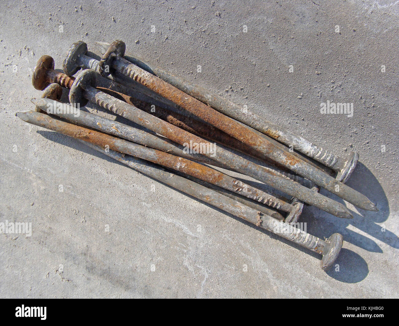 Bunch of weathered galvanized zincify nails for wavy asbestos roof tiles shindles or sheets