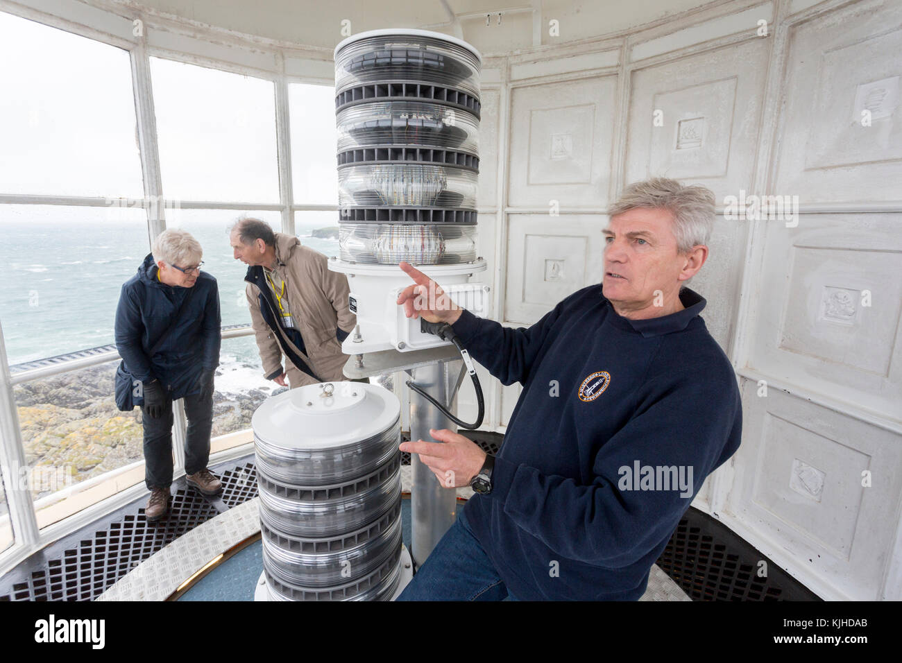 The Northern Lighthouse Board attendant demonstrates how the new LED lantern works at Buchan Ness lighthouse, Boddam, Aberdeenshire, Scotland, UK Stock Photo