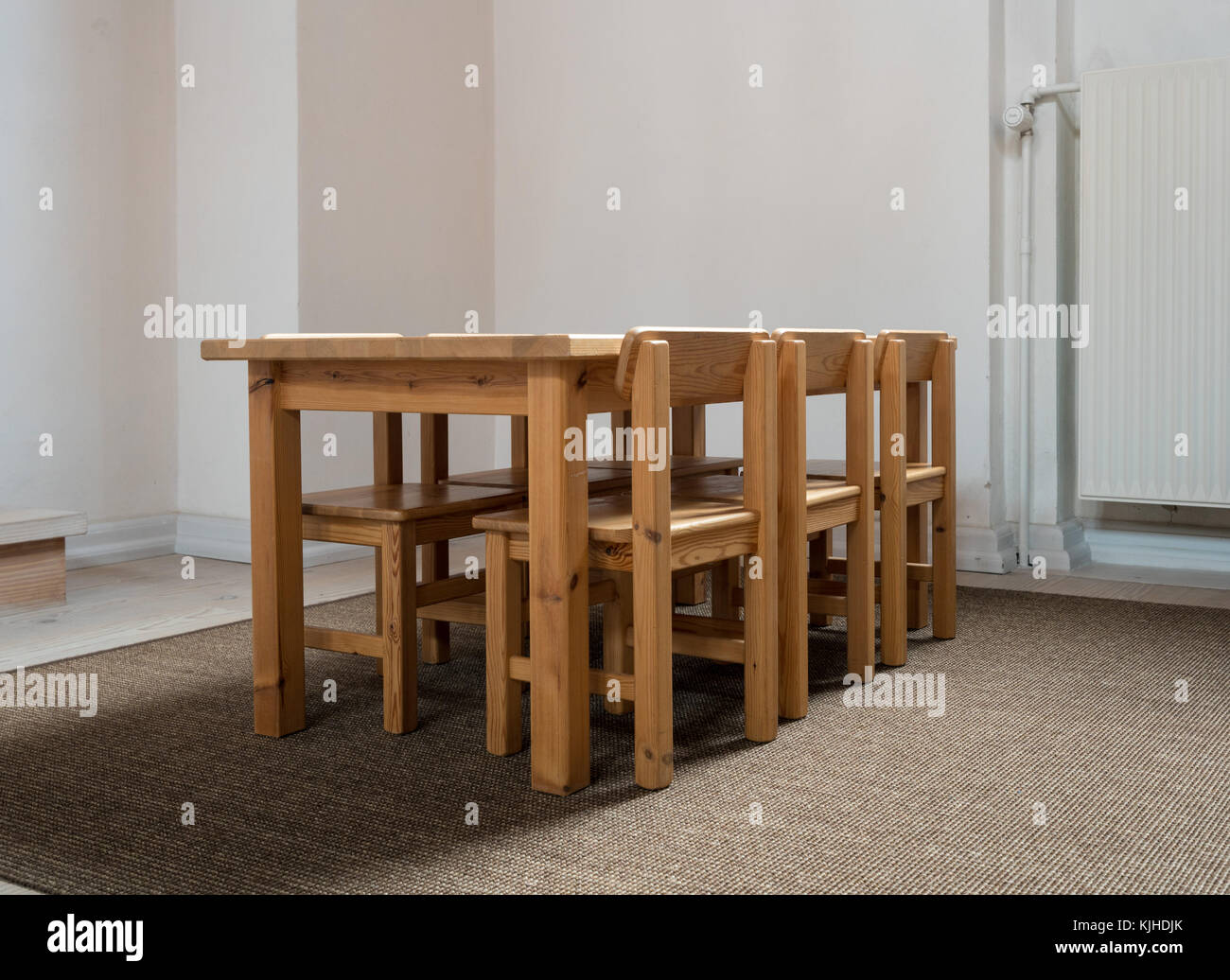Child Sized Table And Six Chairs In Classroom Stock Photo
