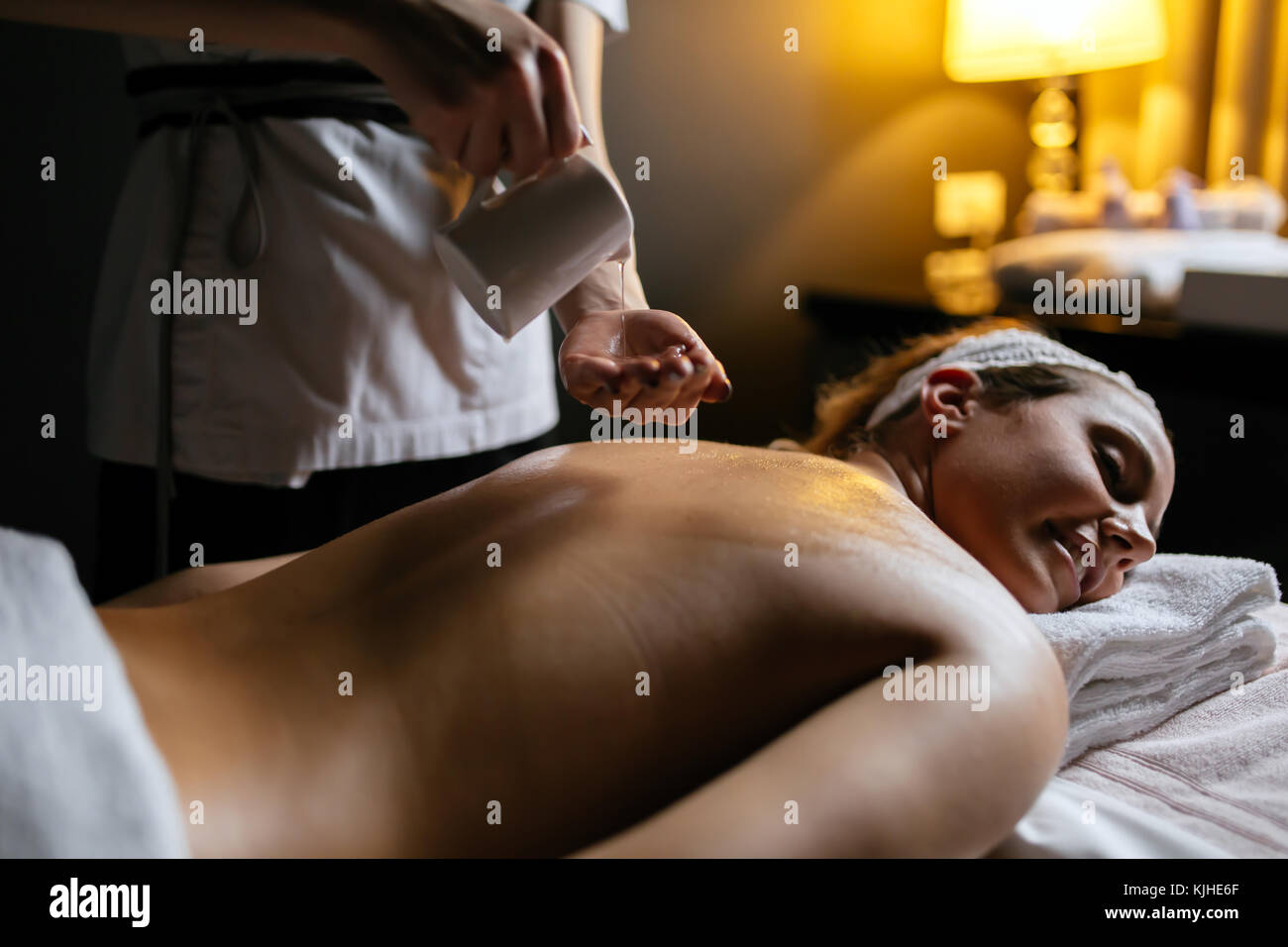 Oil massage treatment Stock Photo