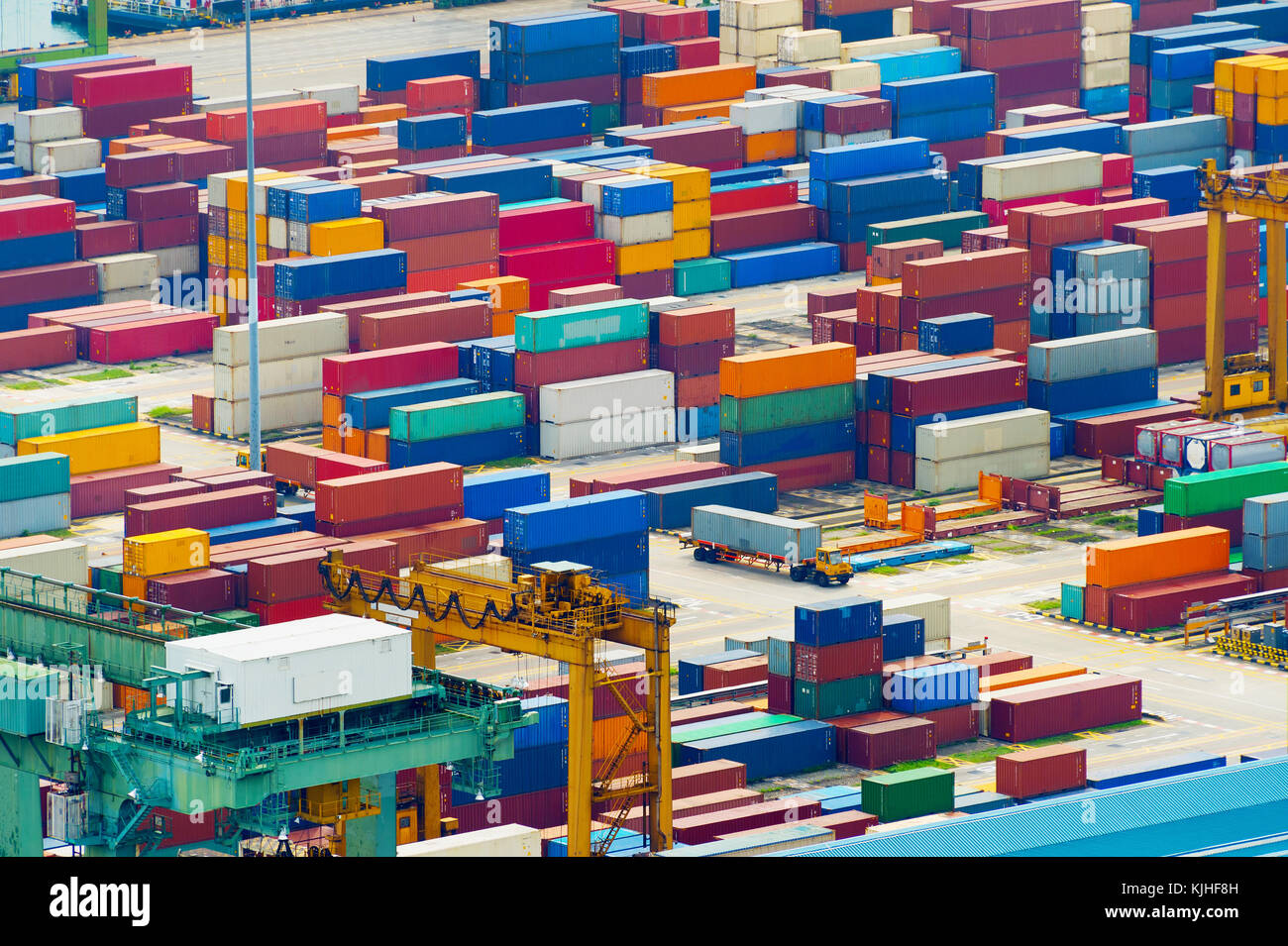 Singapore industrial port full of shipping containers. Aerial view