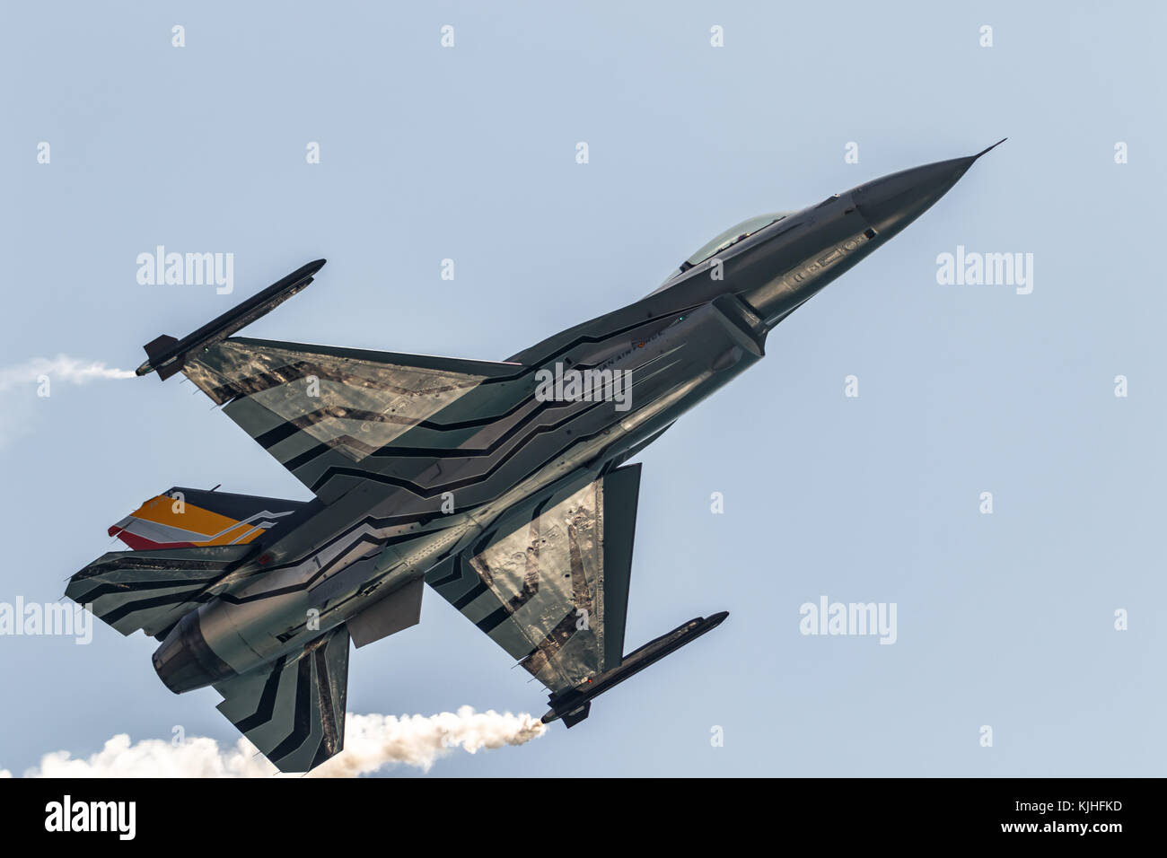 TORRE DEL MAR, MALAGA, SPAIN-JUL 30: Aircraft F-16 Belgian solo display taking part in a exhibition on the 2nd airshow of Torre del Mar on July 30, 20 Stock Photo