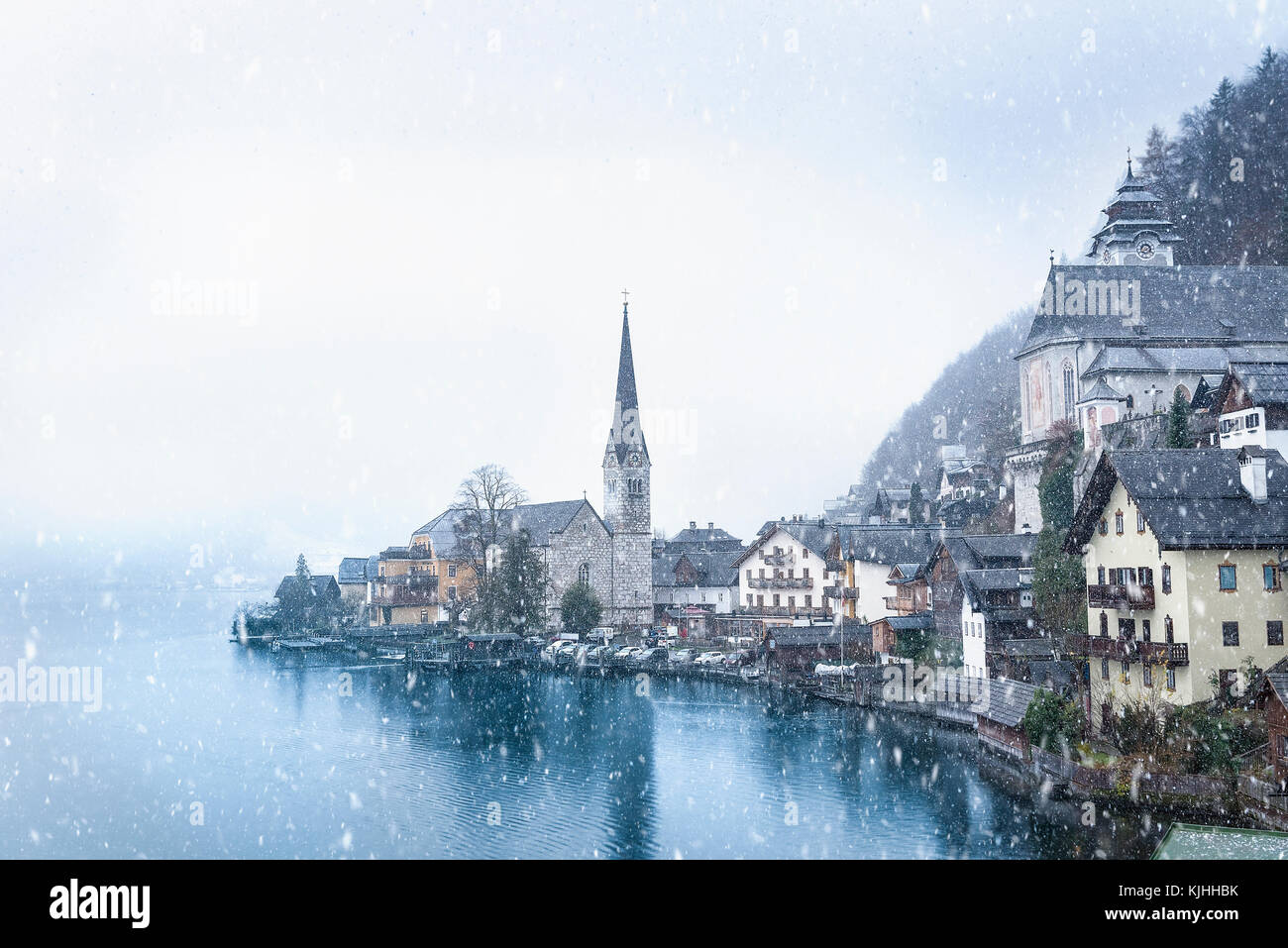 Idyllic winter image with the famous Hallstatt town, one of the World Heritage Sites in Austria, located on the Hallstatter lakeshore Stock Photo