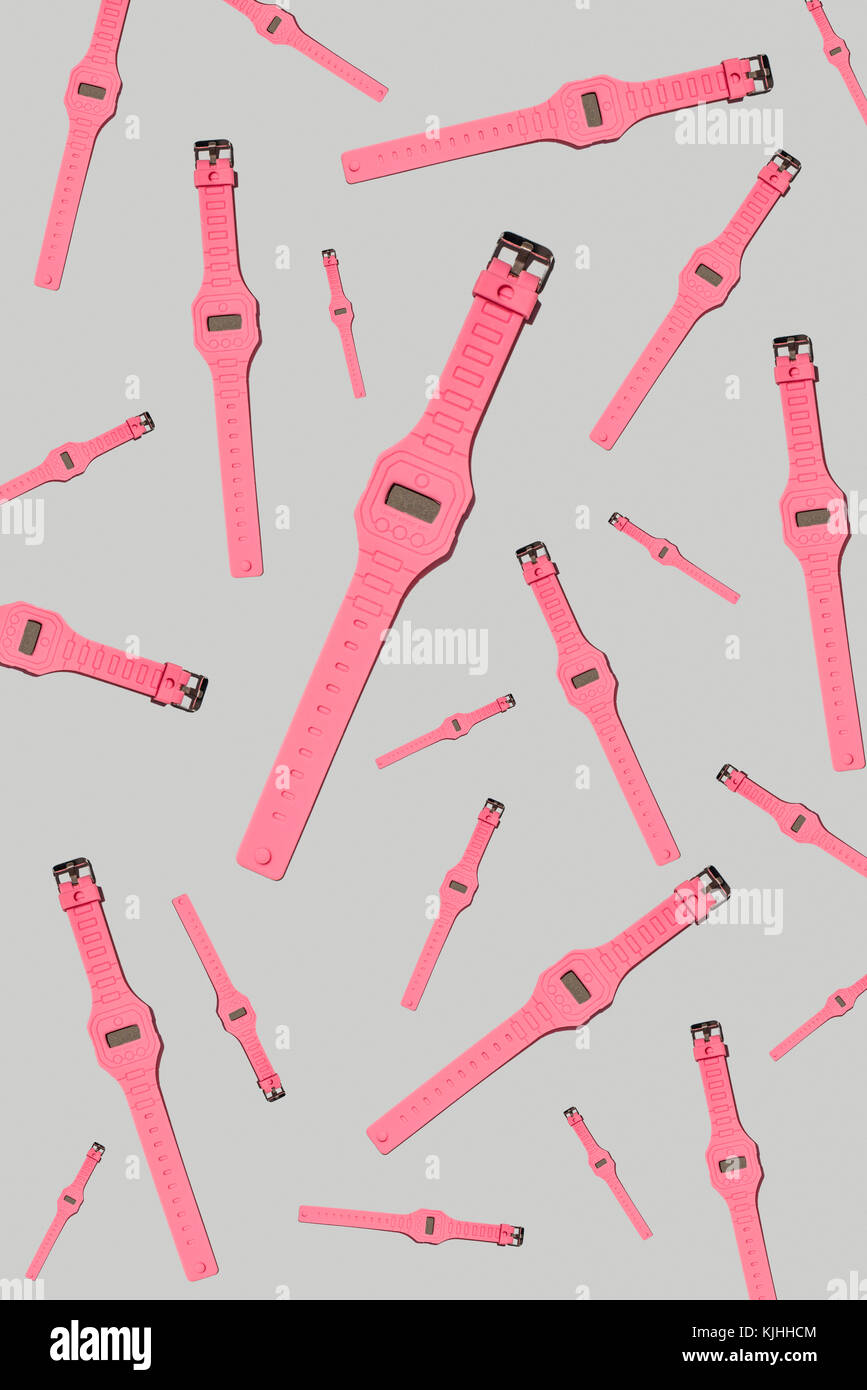 Bright colour hand pink clock pattern Stock Photo - Alamy