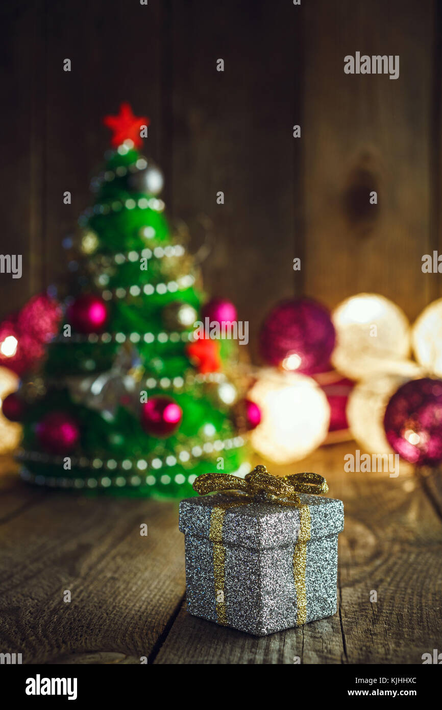 Christmas Background With Decorations And Silver Gift Box On