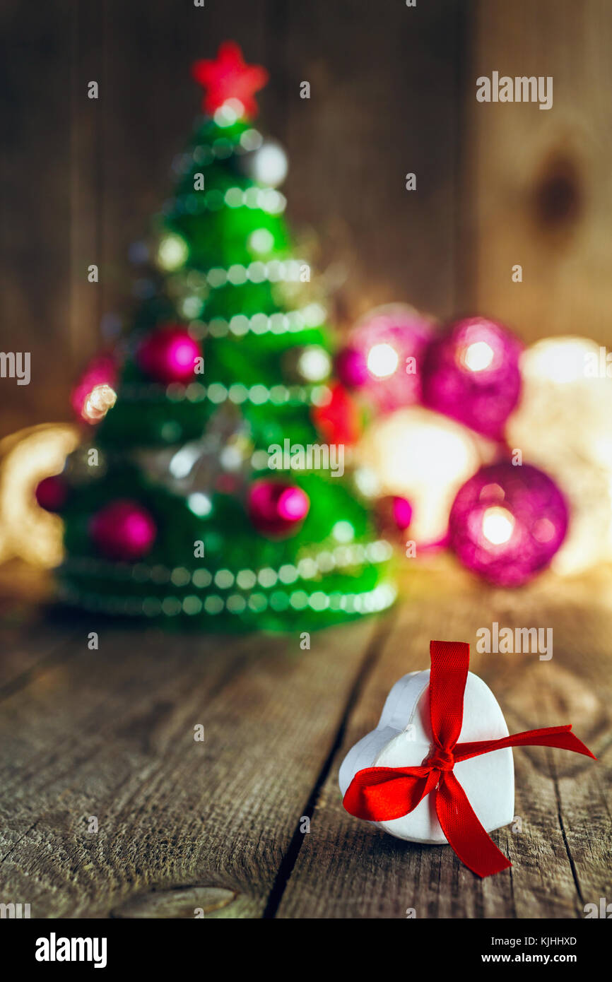 Christmas Background With Decorations And Heart Shaped Gift Box On