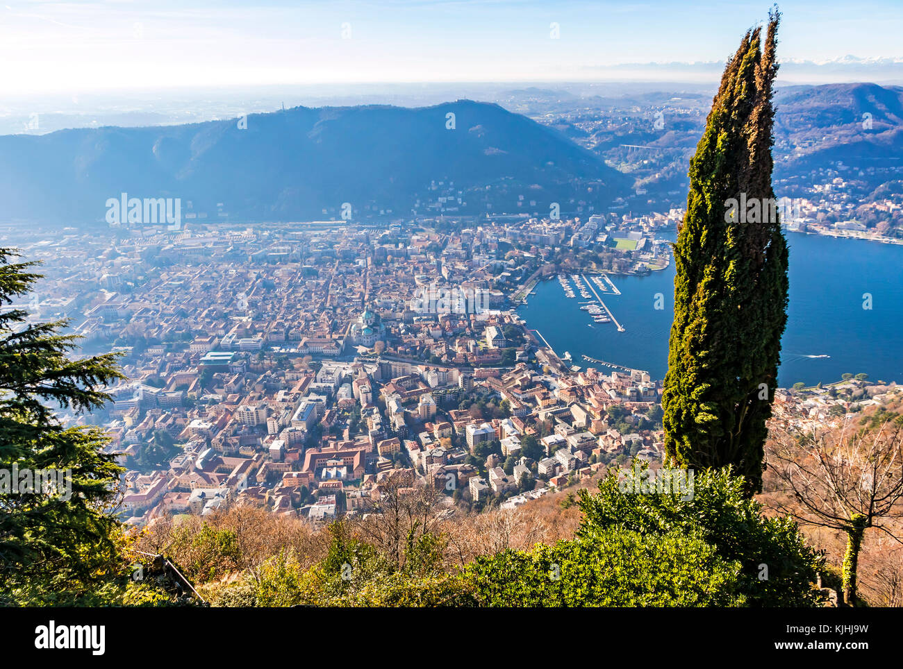 Aerial landscape of the picturesque colorful City of Como on Lake Como, Italy. European Alps on the background. European vacation, living life style,  Stock Photo