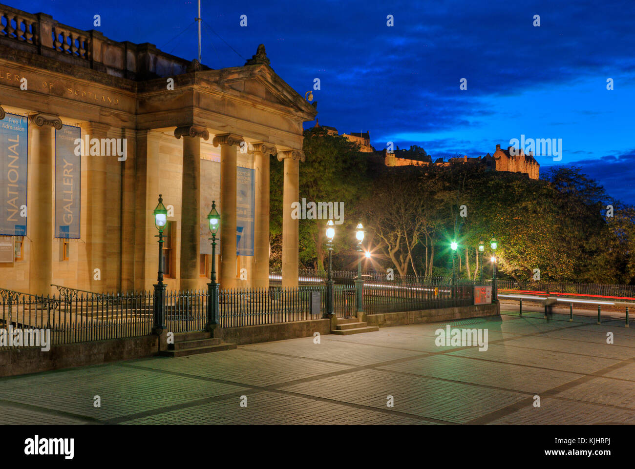 The national gallery and castle at dusk, Edinburgh, Lothian Stock Photo