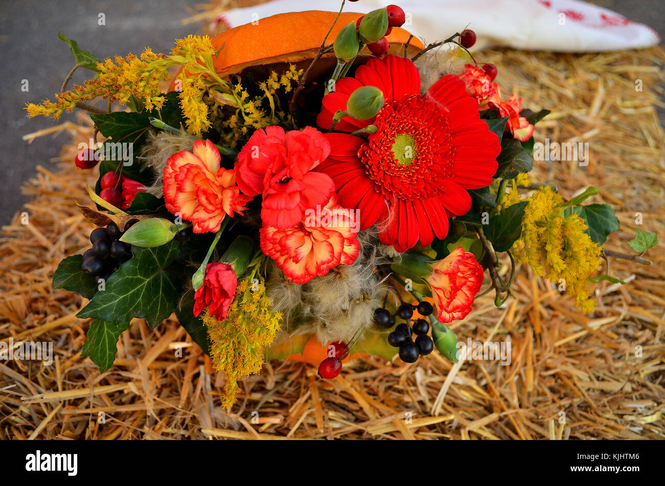Autumn flower bouquet in Pumpkin Stock Photo