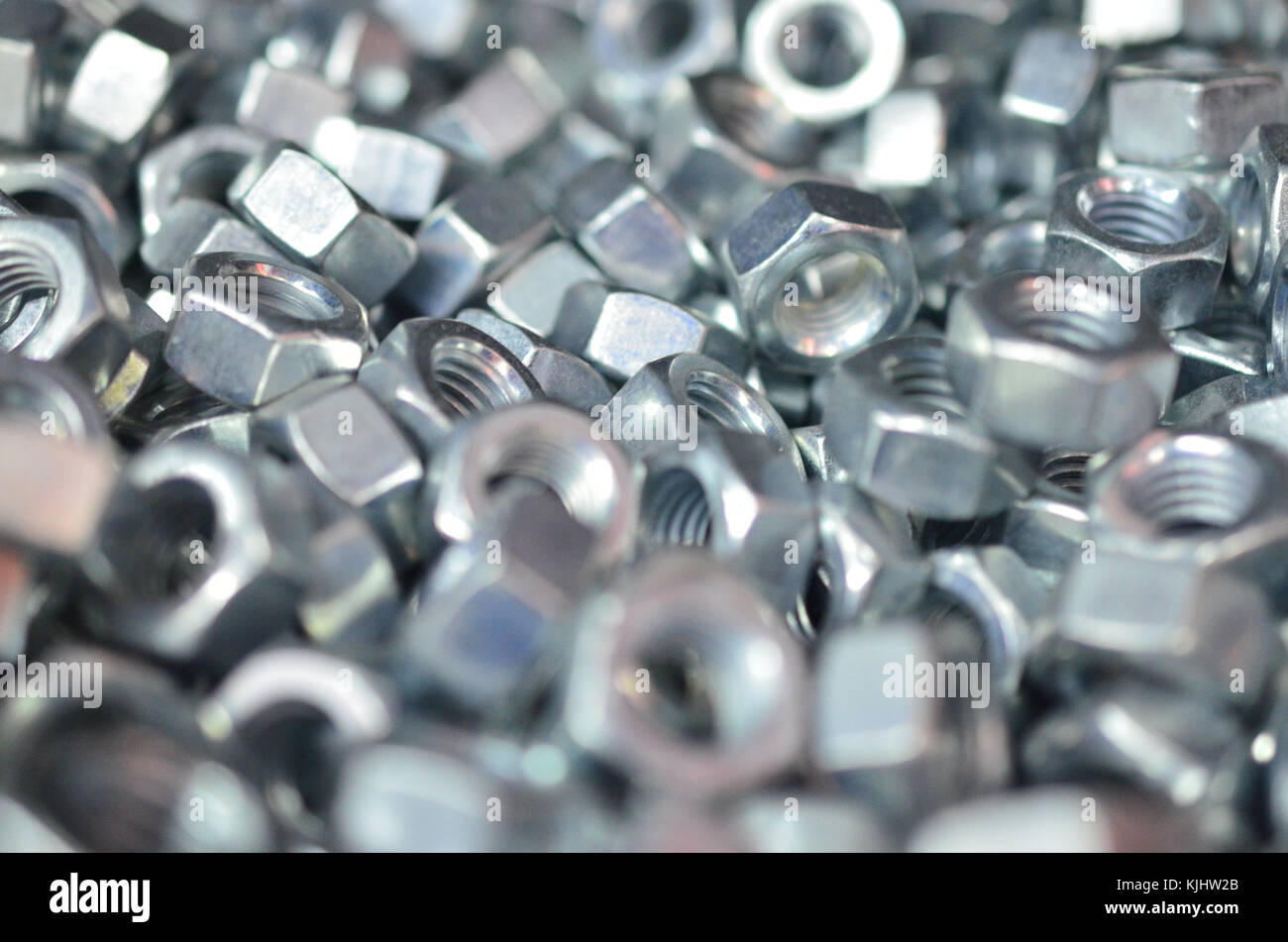 The chrome glossy nut nuts are a lot close-up Stock Photo