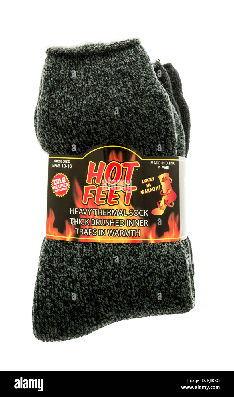 Winneconne, WI - 14 November 2017:  A pair of Hot Feet socks to help keep feet warm during winter on an on an isolated background. Stock Photo
