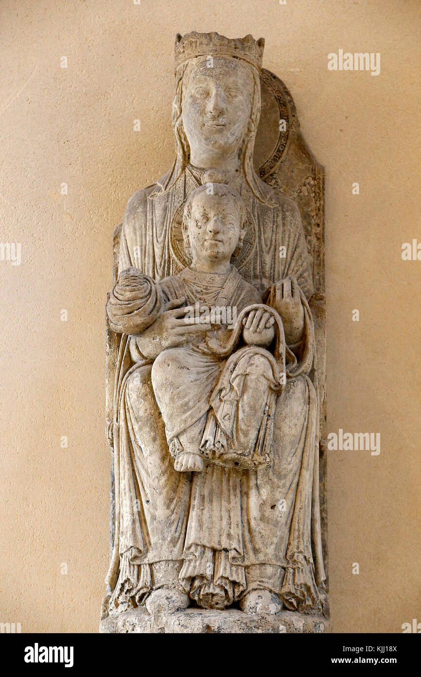 Louvre museum. Stone Virgin and child. Pierre. Ile-de-France, 12th century. France. Stock Photo