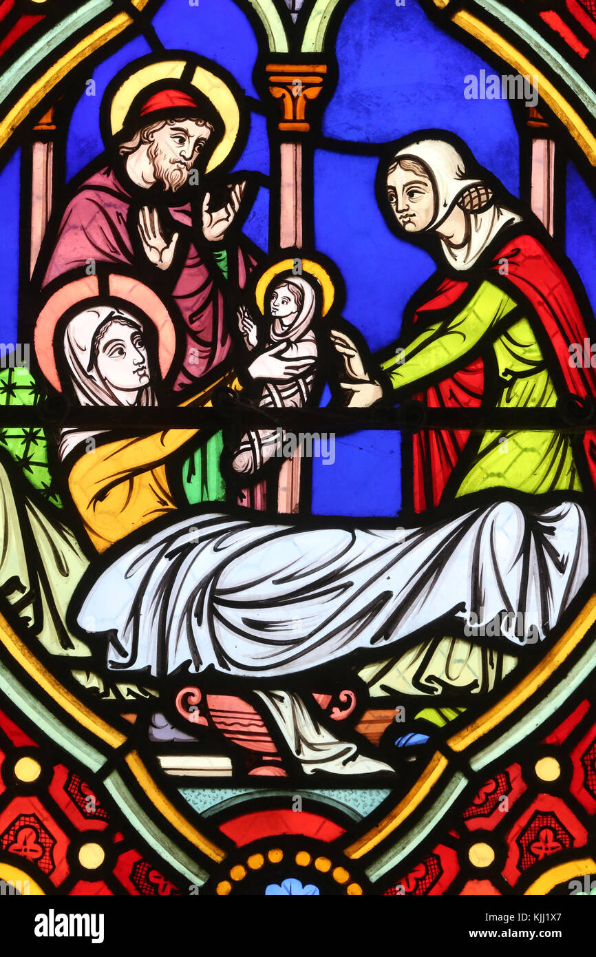 Saint-Pere church.  Stained glass window.  Birth of Virgin Mary.  France. Stock Photo