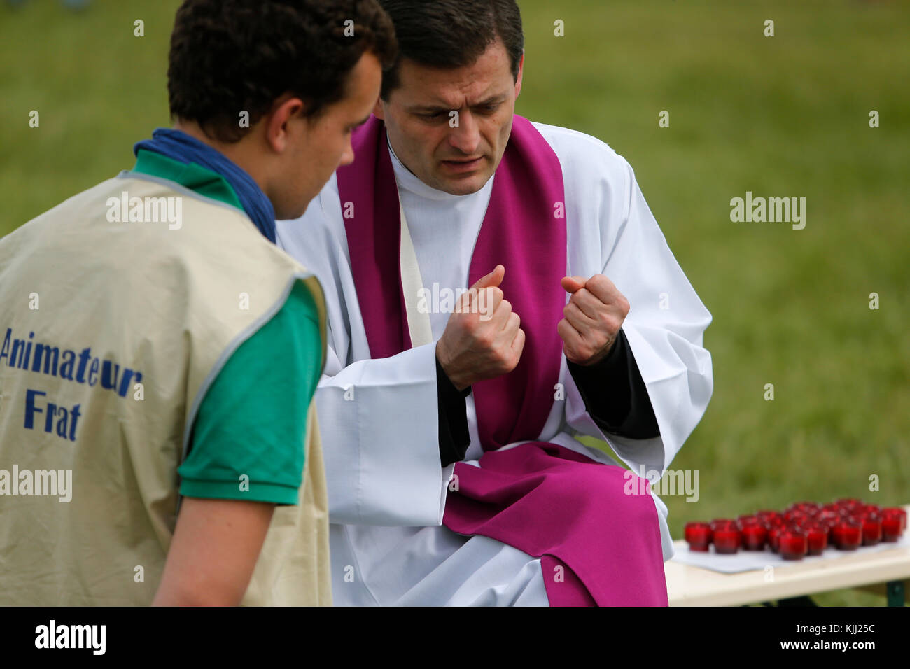 Confession at the FRAT catholic youth camp. France. Stock Photo