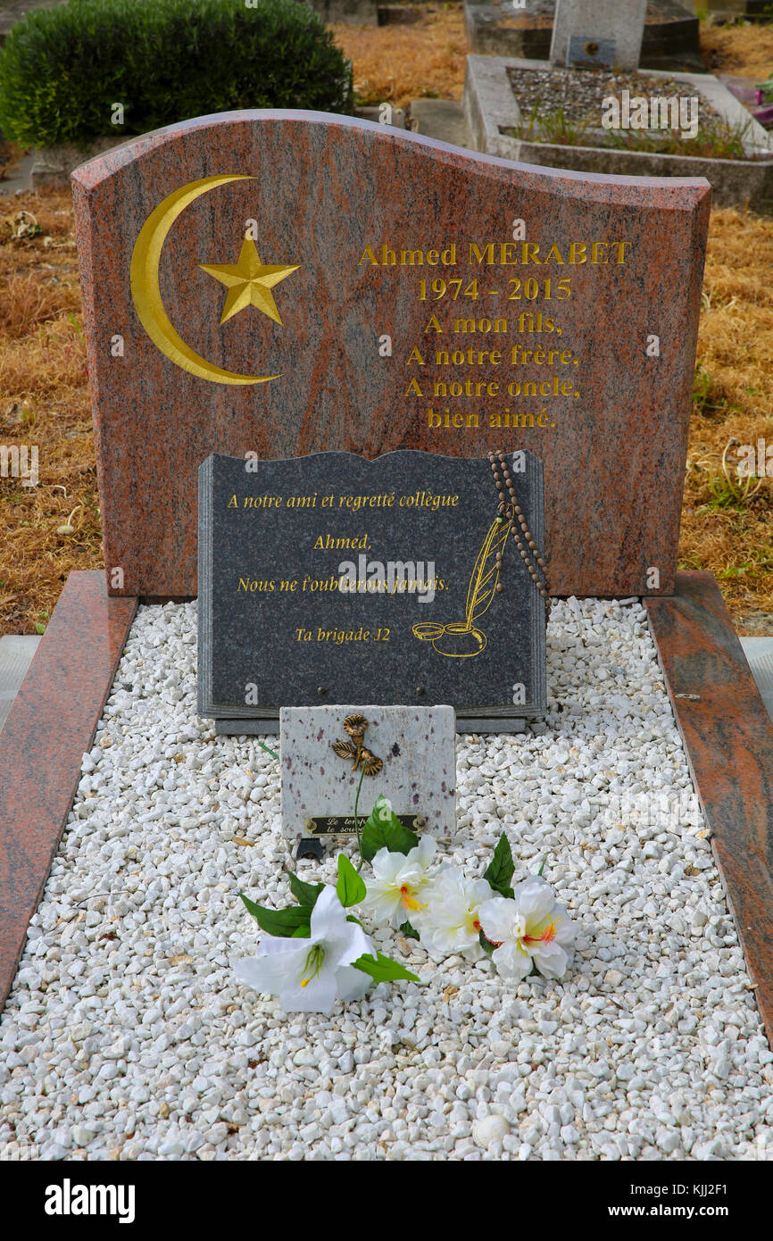 Muslim graveyard in Bobigny, France. Ahmet Merabet's grave (first victim of the Charlie Hebdo killings). Stock Photo