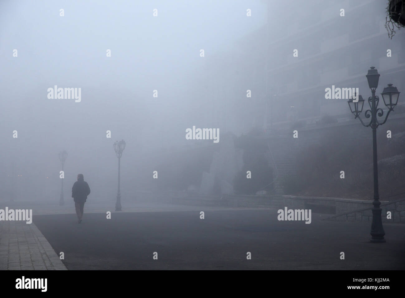 Man and fog.  France. Stock Photo