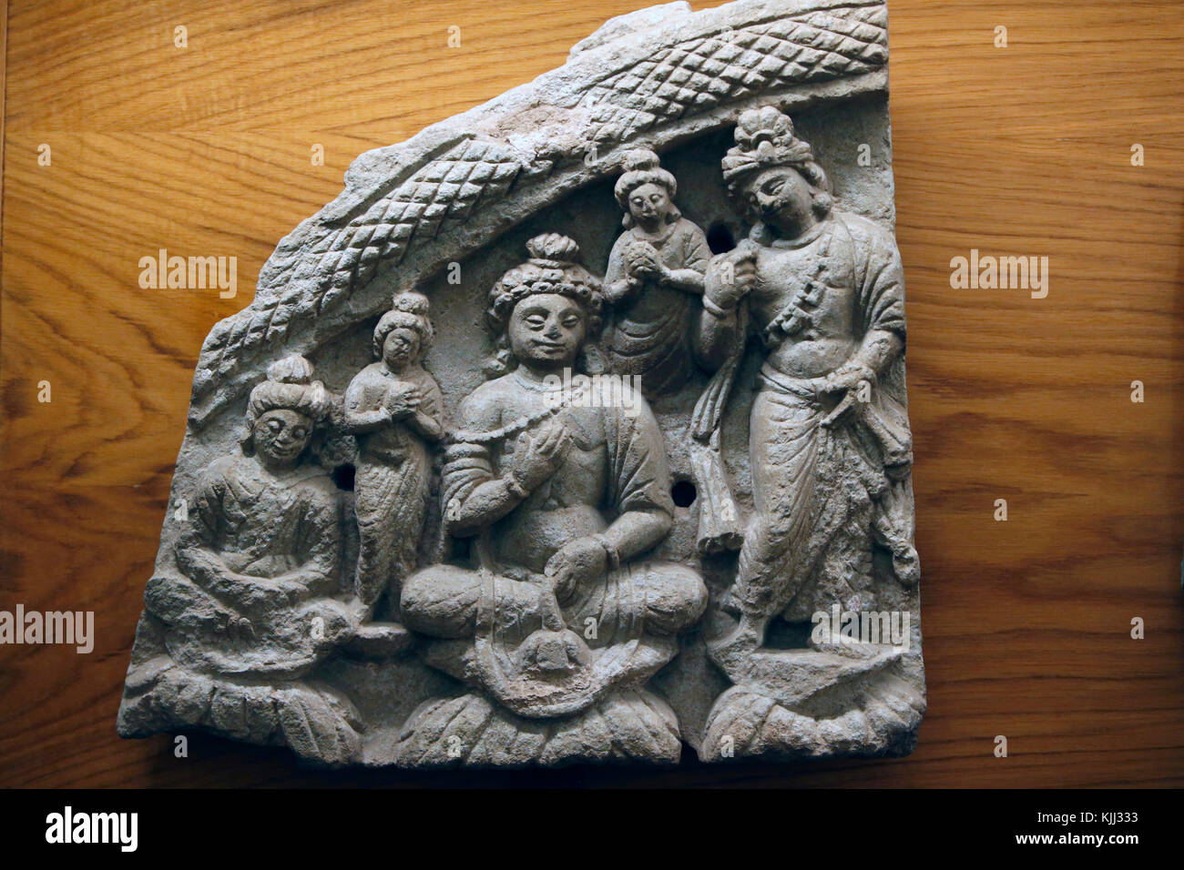 National Museum of Oriental Art, Rome. Gandhara art. Buddha with disciples. Swat valley, Pakistan. Schist. Ist century. Italy. Stock Photo