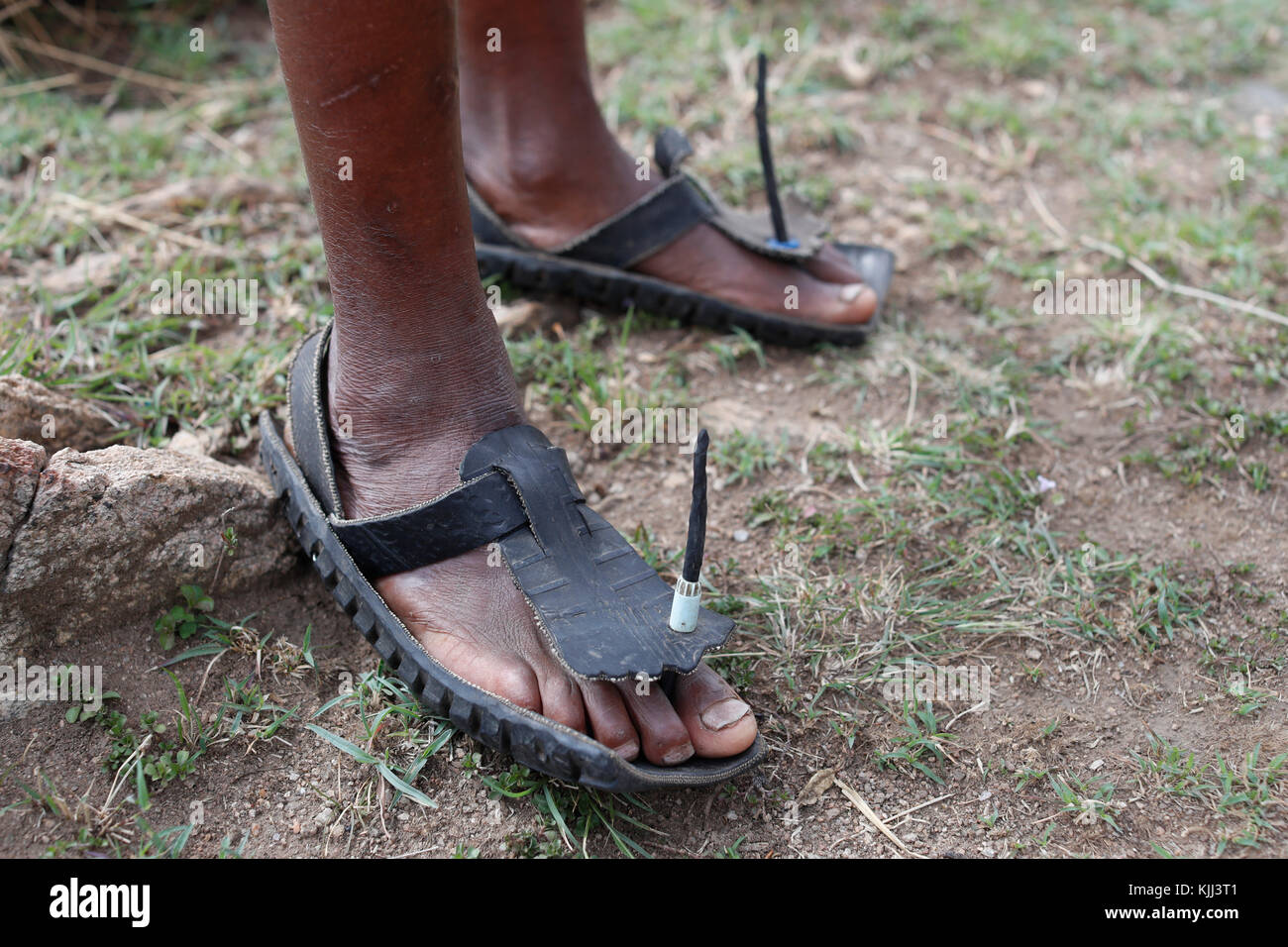 Masai  traditional sandals made from car tires.  Masai Mara game reserve. Kenya. Stock Photo