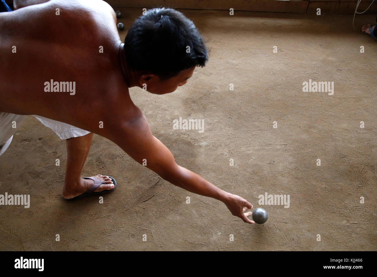 Khmers playing bowls in Battambang. Cambodia. Stock Photo