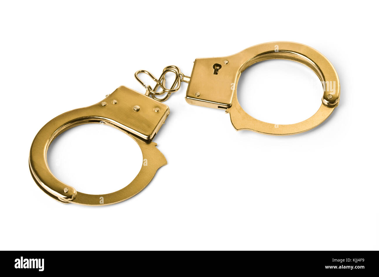 golden handcuffs isolated in white. with clipping path Stock Photo Alamy