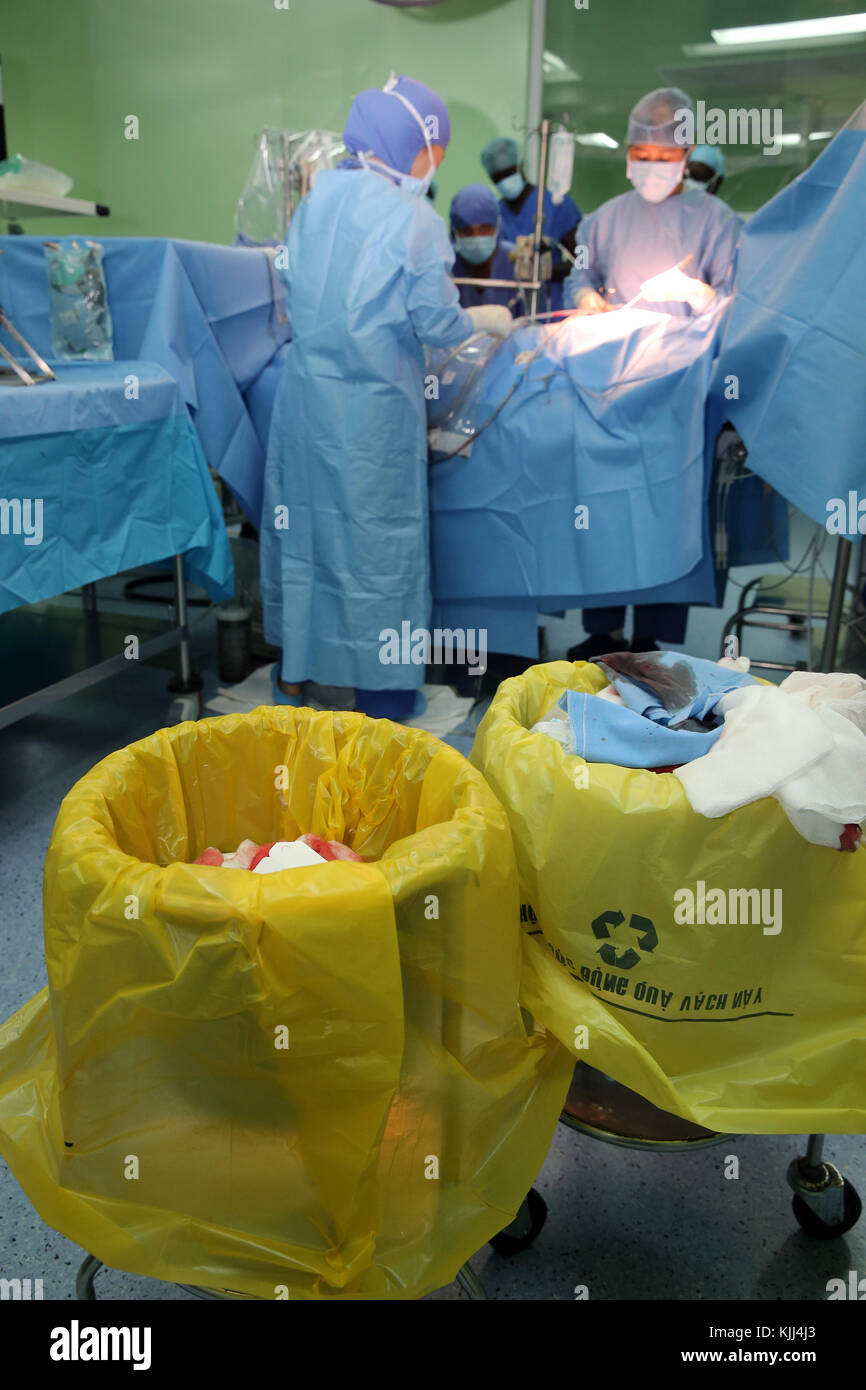 Operating theater. Cardiac surgery. Waste containers.  Vietnam. Stock Photo