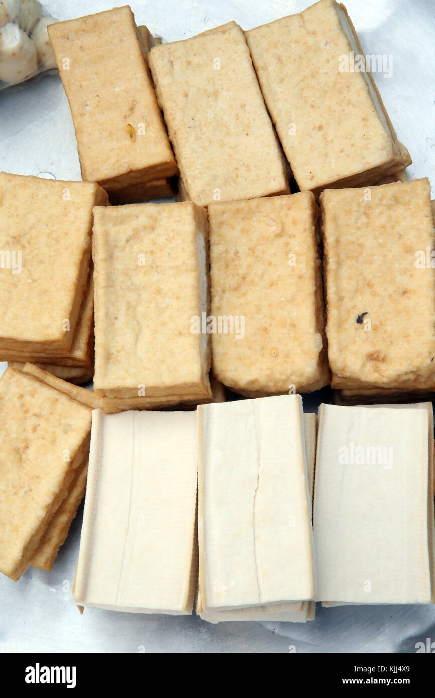 Cut tofu cubes in tray.  Thay Ninh. Vietnam. Stock Photo