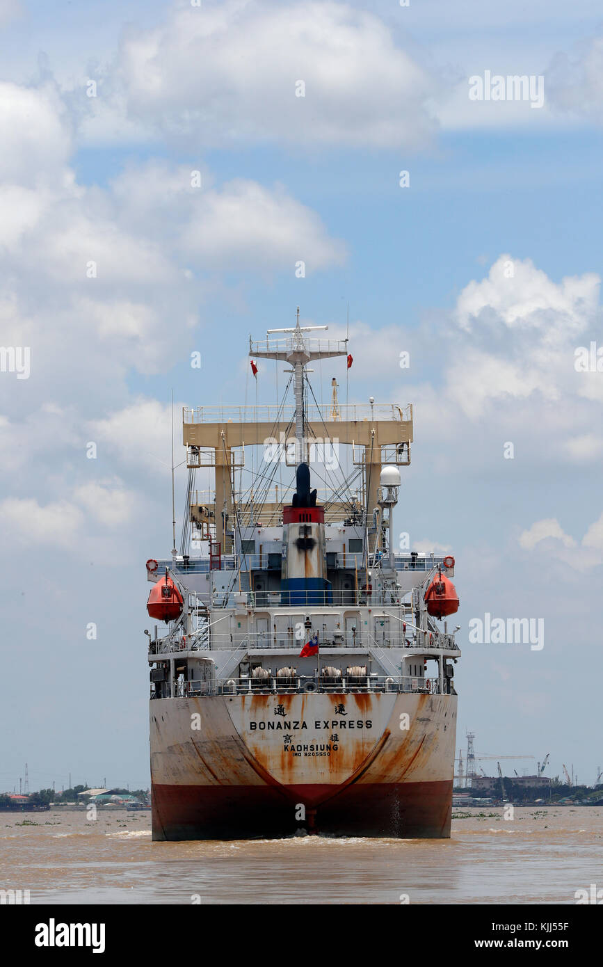 Cargo ship in Saigon river. Vietnam. Stock Photo