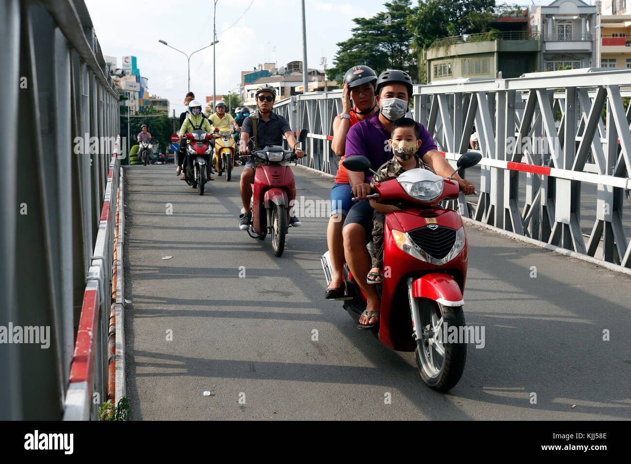 HOCHIMINH CITY, VIETNAM - Feb 24, 2017: People Cross The Road In