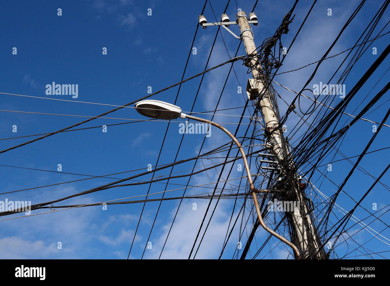 Low Angle View Of Electricity Pylon Against Clear Sky.  Kon Tum. Vietnam. Stock Photo