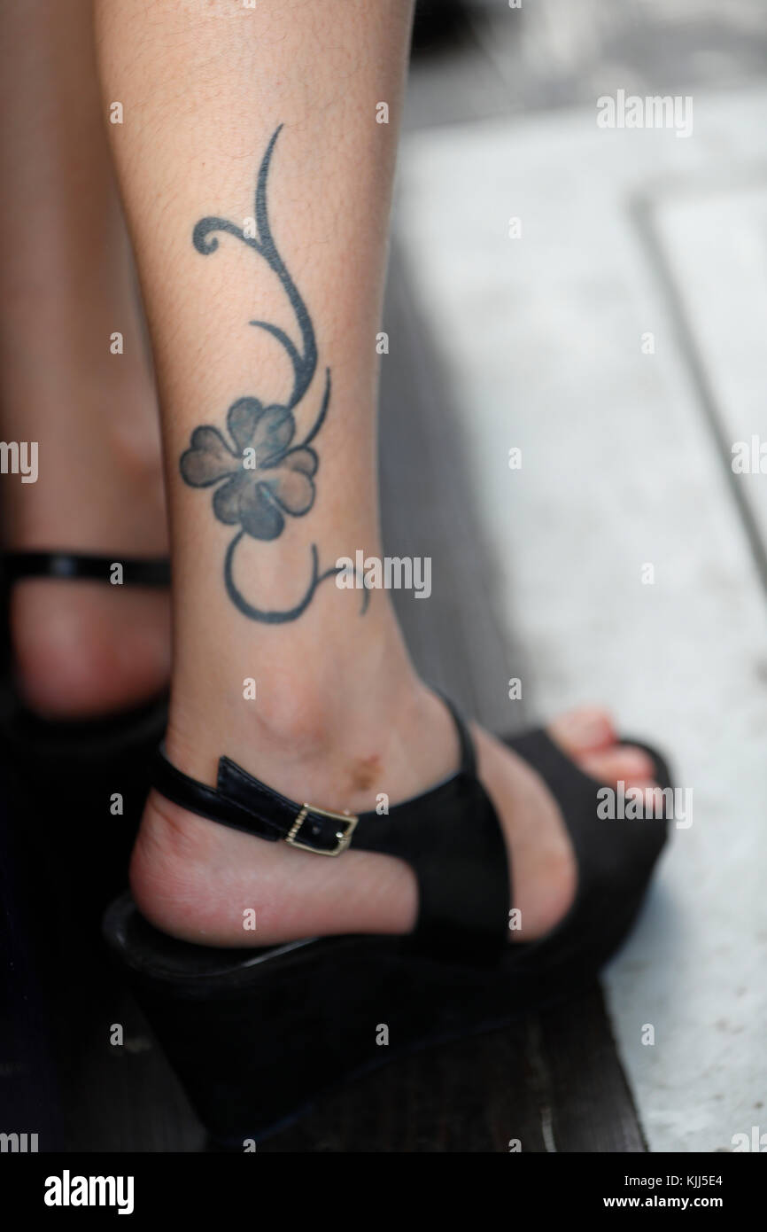 Leg tattoo hi-res stock photography and images - Alamy