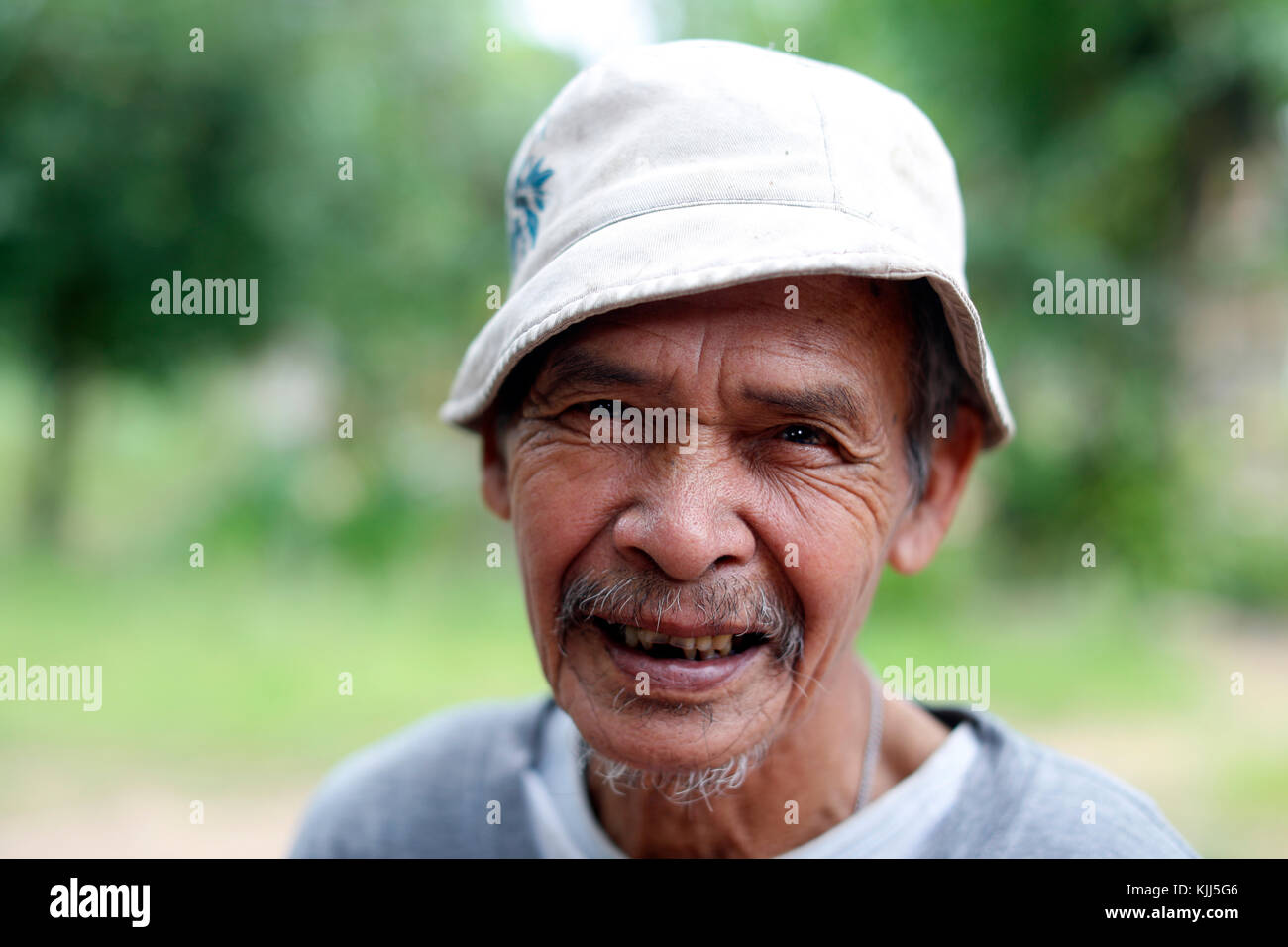 Bahnar (Ba Na) ethnic group.  Portrait of old man.  Kon Tum. Vietnam. Stock Photo