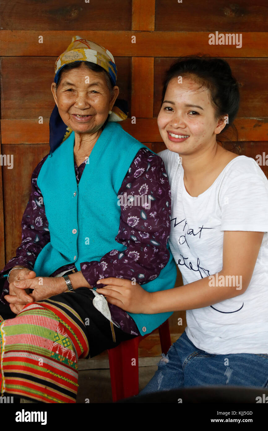 Bahnar (Ba Na) ethnic group. Two generations of women.  Kon Tum. Vietnam. Stock Photo