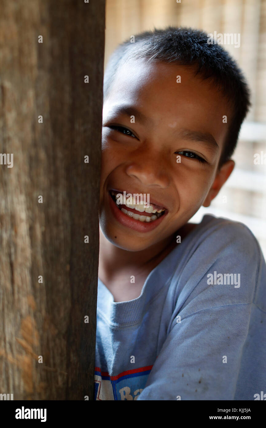 Bahnar (Ba Na) ethnic group. Young boy smil. Portrait.  Kon Tum. Vietnam. Stock Photo
