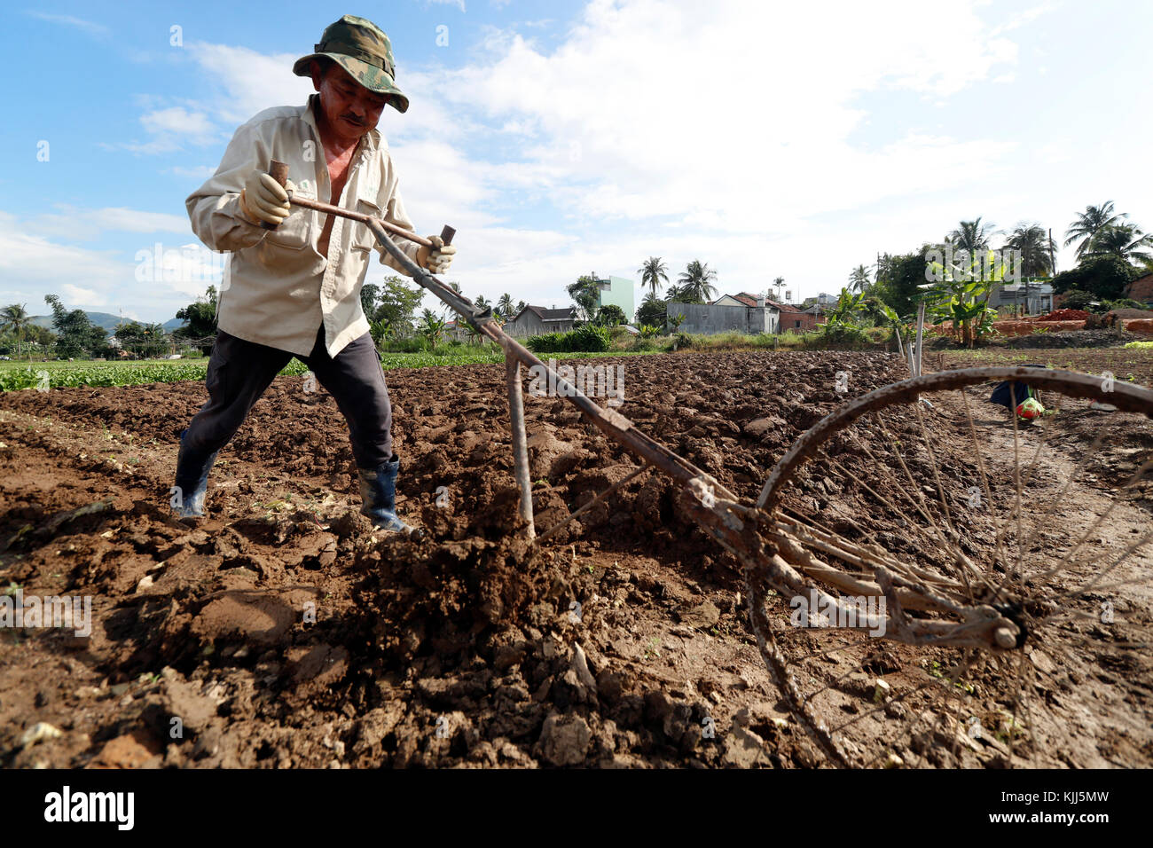 Agricultural field. Agriculture field. Farmer at work. Plough on.  Kon Tum. Vietnam. Stock Photo