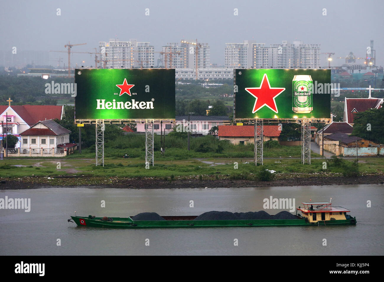 Vietnam, Ho Chi Minh City, ship on Saigon River during Heavy Monsoon Rain.  Vietnam. Stock Photo