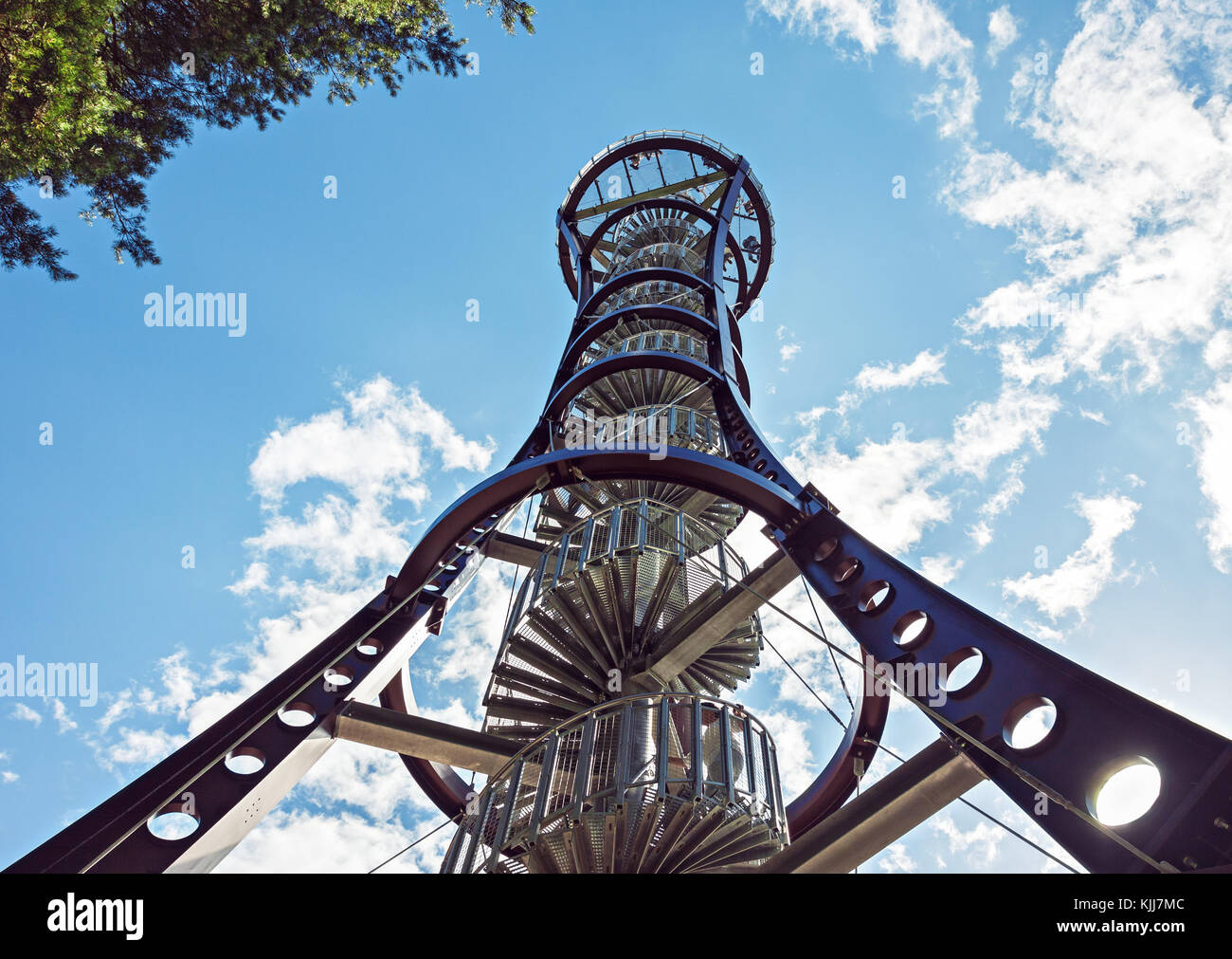 Metal structure of tall wildlife observation tower in Mindunai, Lithuania. Low angle outdoor picture Stock Photo