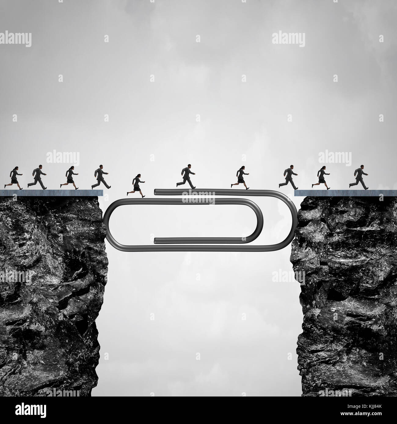 Office solution concept as people crossing a bridge created by a giant paper clip or paperclip as a business worker success metaphor. Stock Photo