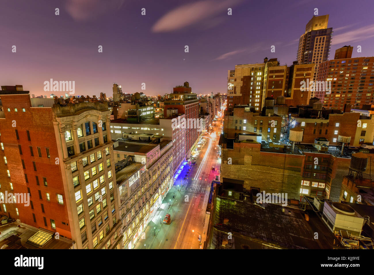 New York City streets at night with lights and traffic Stock Photo - Alamy