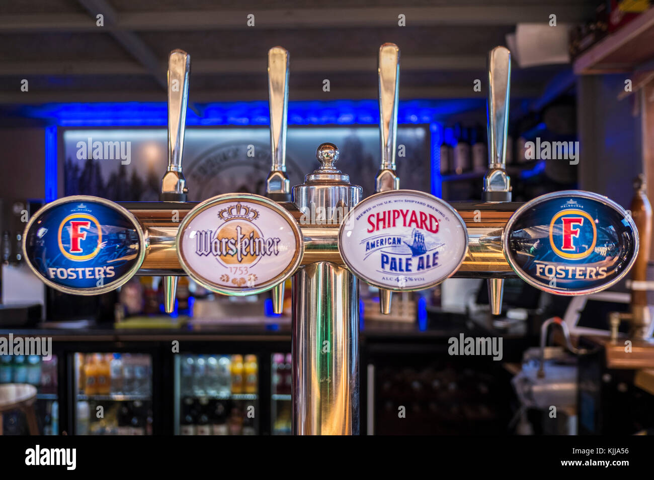 Fosters , Warsteiner & Shipyard Beer Pumps on a Bar Stock Photo