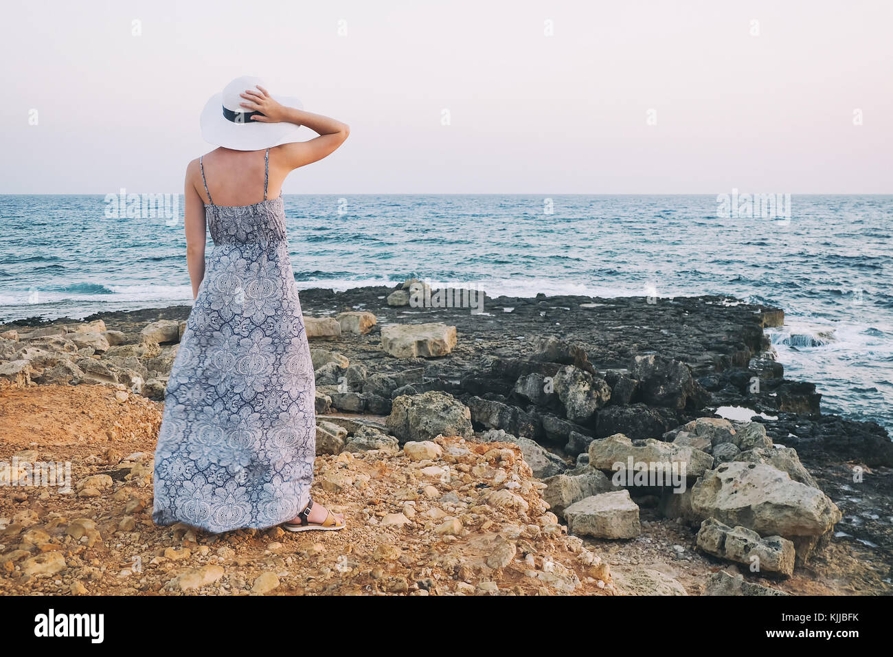 Woman dress rear view windy hi-res stock photography and images - Alamy