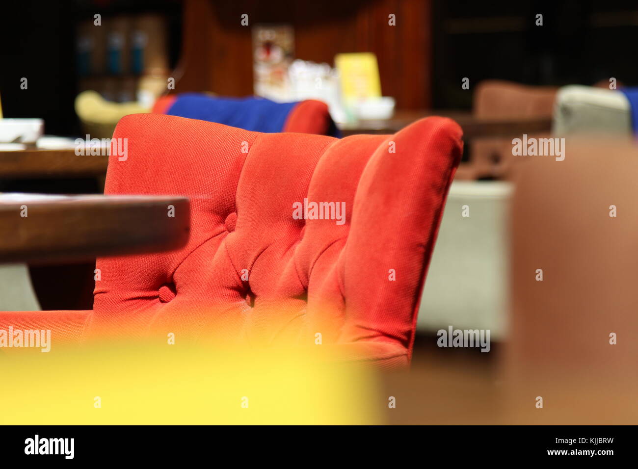 Colored chairs in a cafe restaurant on a sunny day Stock Photo