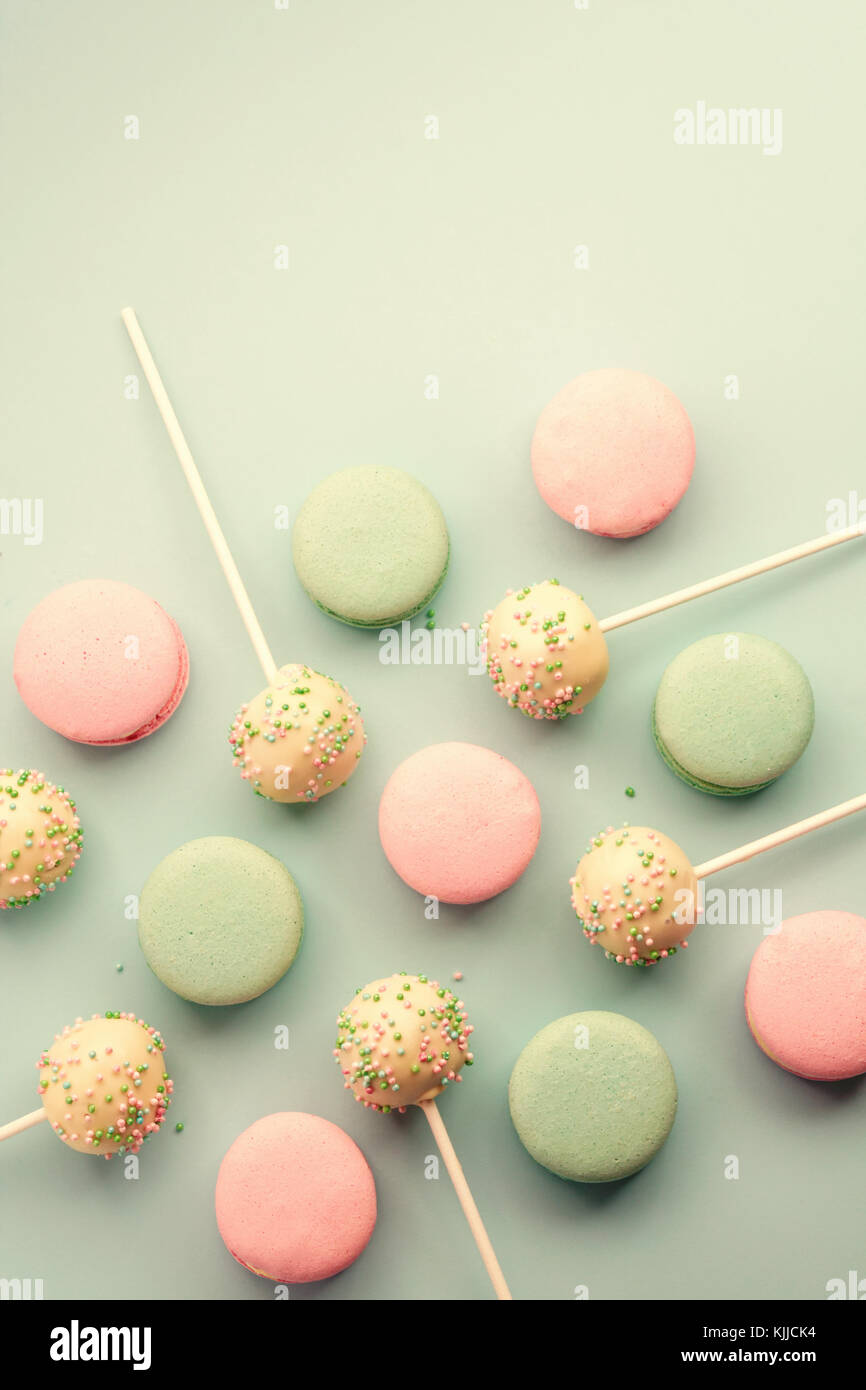 Pastel color macaroons with sweet cake pops Stock Photo