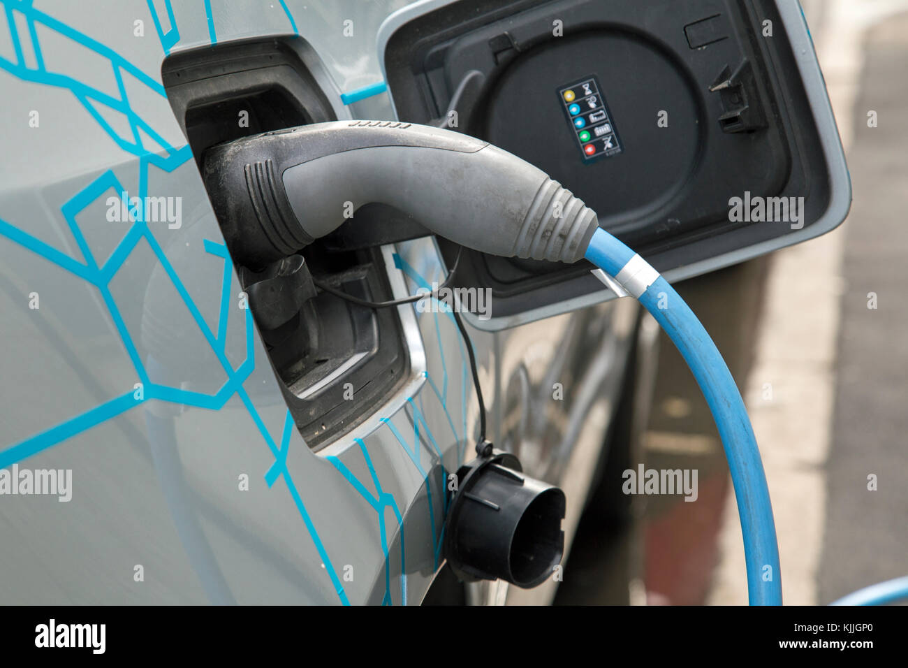 November 2017, London, England, An electric vehicle is charged on the ...