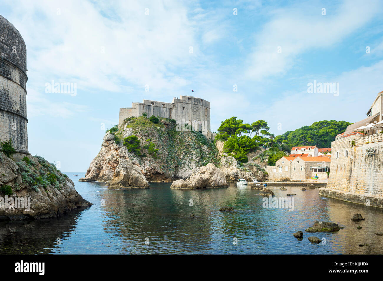 Scenic view of the turquoise Mediterranean waters surrounding the walled medieval city of Dubrovnik, Croatia Stock Photo